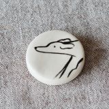 Imán hecho y pintado a mano en cerámica